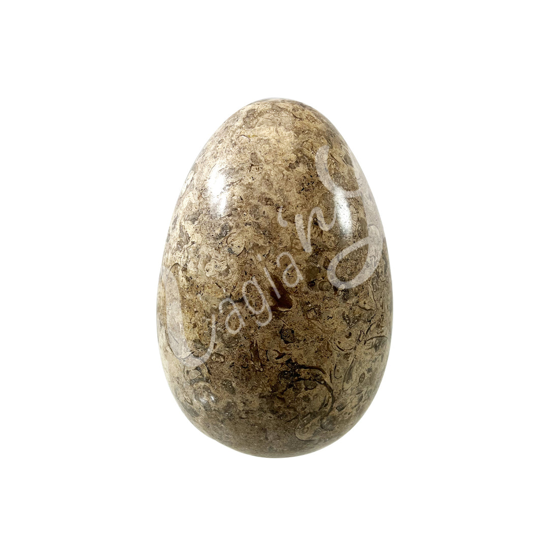 Egg-shaped piece made of Coral.