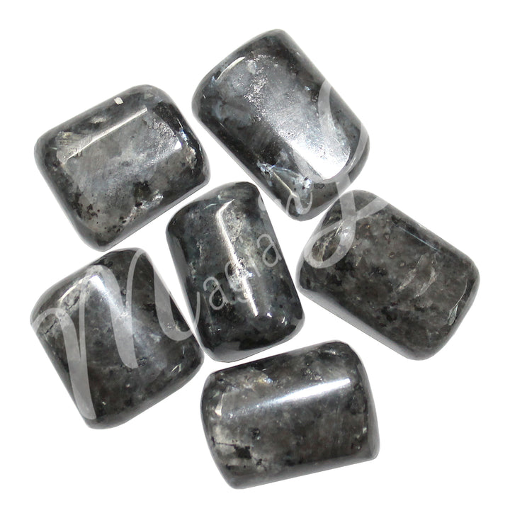 Six polished tumbled stone in shades of gray, black and dark gray, arranged in a circular pattern.