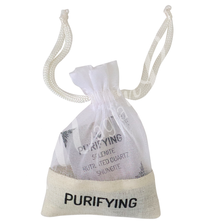 A small white drawstring pouch labeled “PURIFYING”.