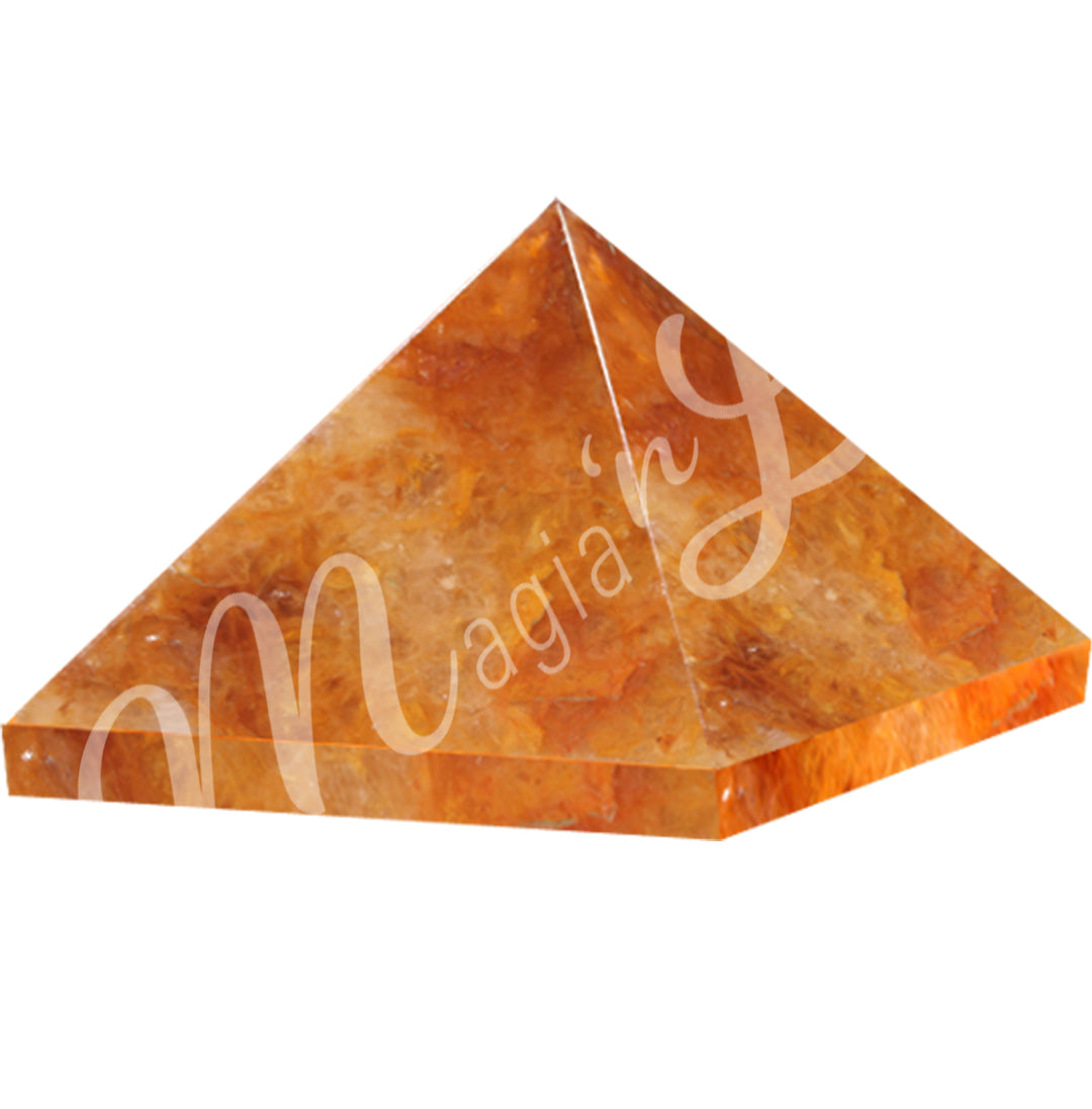 A four side pyramid made of Golden Healer Quartz.