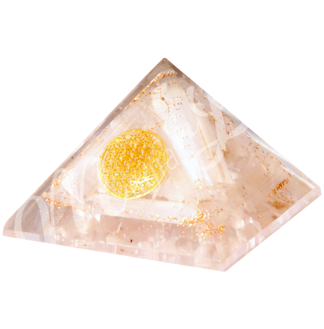 A four side pyramid made of Selenite in Orgone, featuring the flower of life symbol on one side.