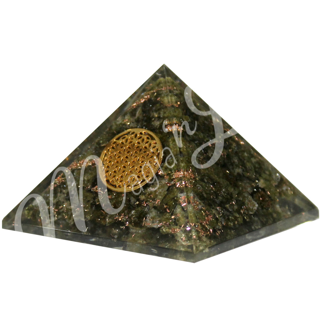 A four side pyramid made of Epidote in Orgone, featuring the flower of life symbol on one side.