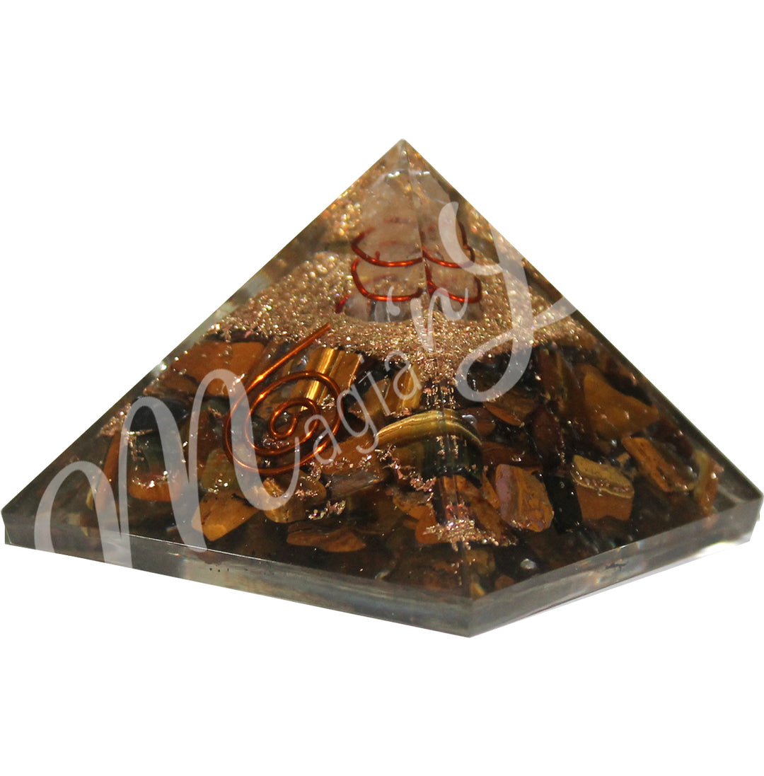 A four side pyramid made of Tiger Eye in Orgone with copper spiral.