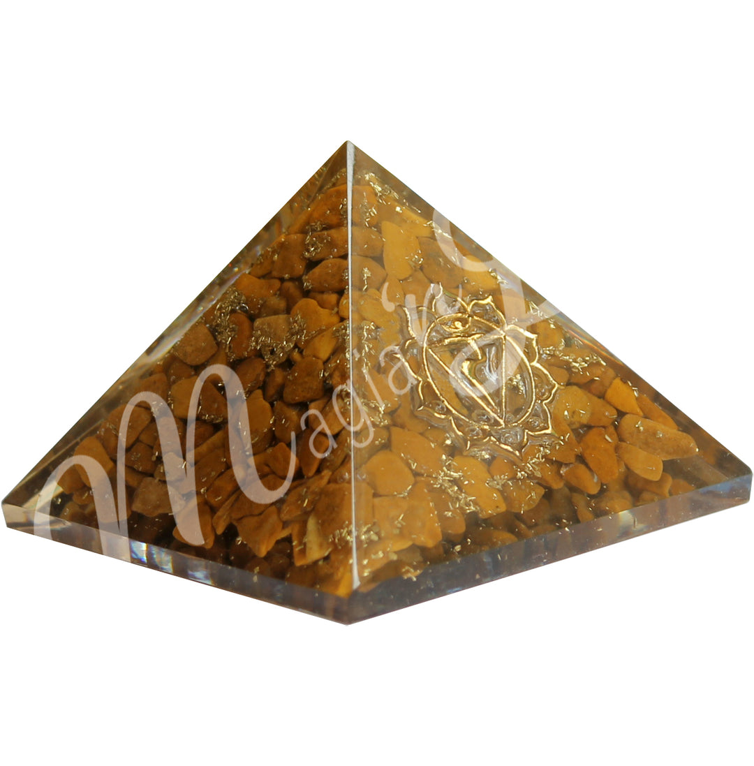 A four side pyramid made of Yellow Jasper in Orgone, featuring the solar plexus chakra symbol on one side.