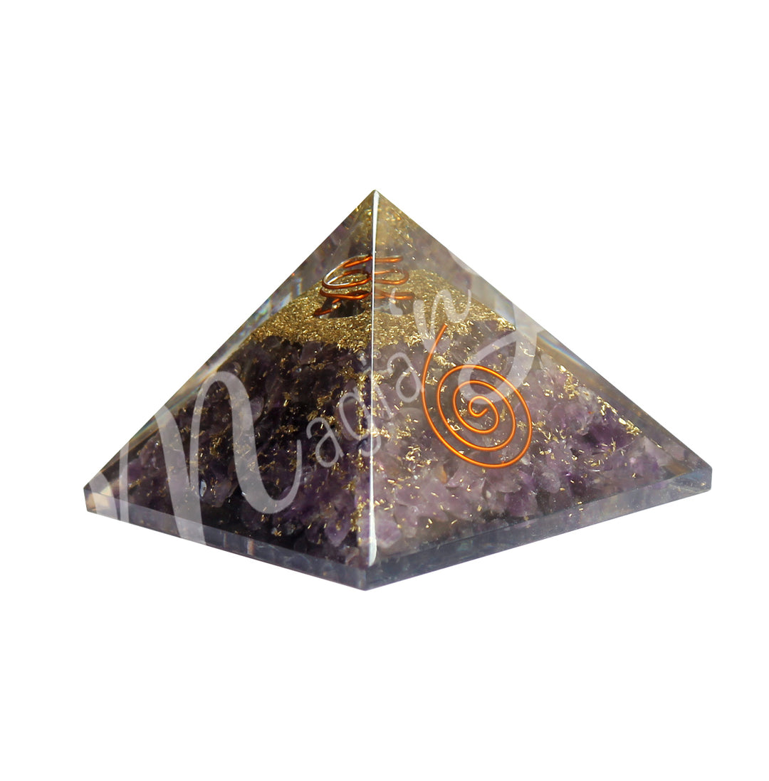 A four side pyramid made of Amehyst in Orgone, featuring a copper spiral inside and on one side.