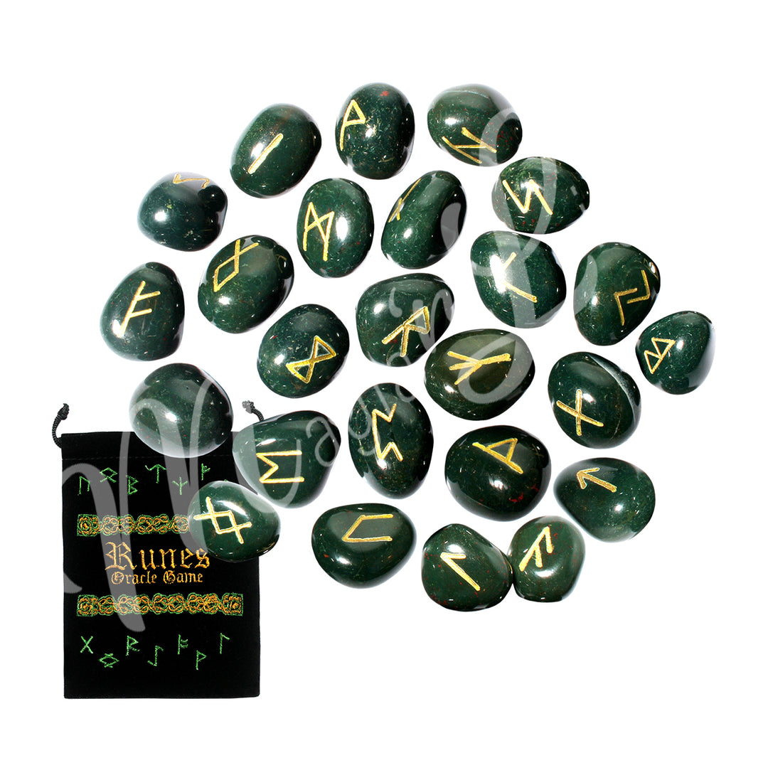 A set of bloodstone runestones with engraved and painted gold symbols, displayed with a black velvet pouch. The pouch is embroidered with the words "runes oracle game", as well as runic symbols.