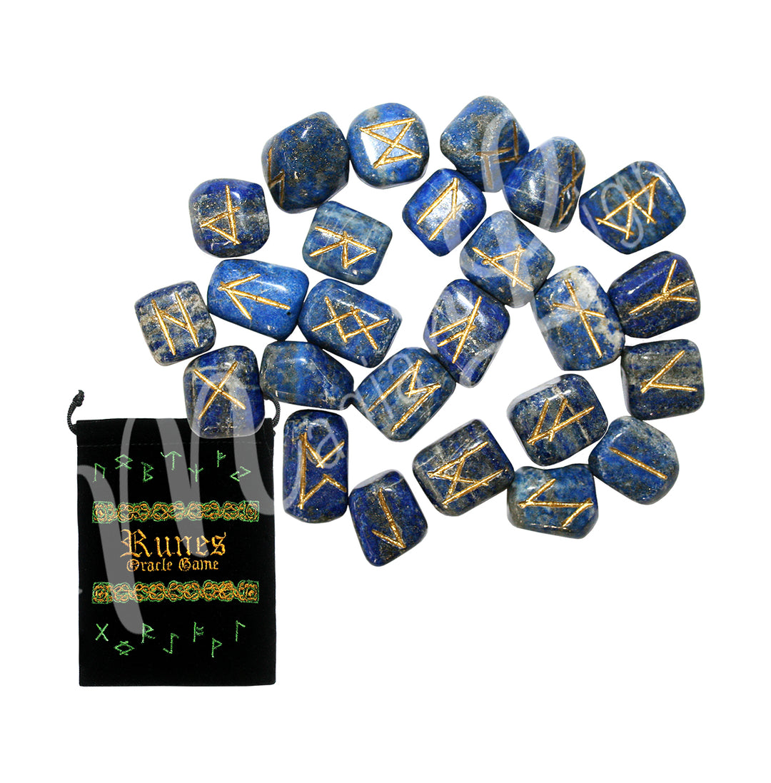 A set of lapis lazuli runestones with engraved and painted gold symbols, displayed with a black velvet pouch. The pouch is embroidered with the words "runes oracle game", as well as runic symbols.
