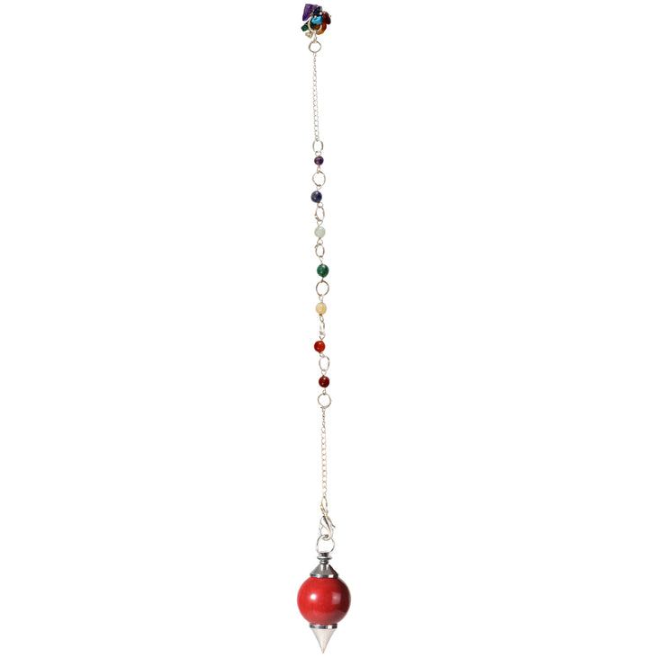 Silver pendulum with a red jasper spherical stone and a pointed metal tip, suspended from a silver chain ans chakra beads with chakra chips at the end.
