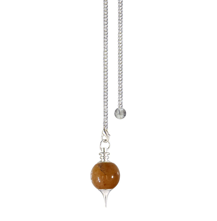 Silver pendulum with a red aventurine spherical stone and a pointed metal tip, suspended from a silver chain with a small clear bead at the end.