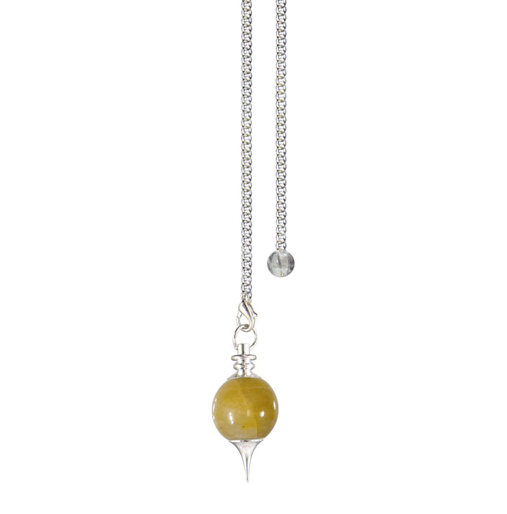 Silver pendulum with a yellow jasper spherical stone and a pointed metal tip, suspended from a silver chain with a small clear bead at the end.