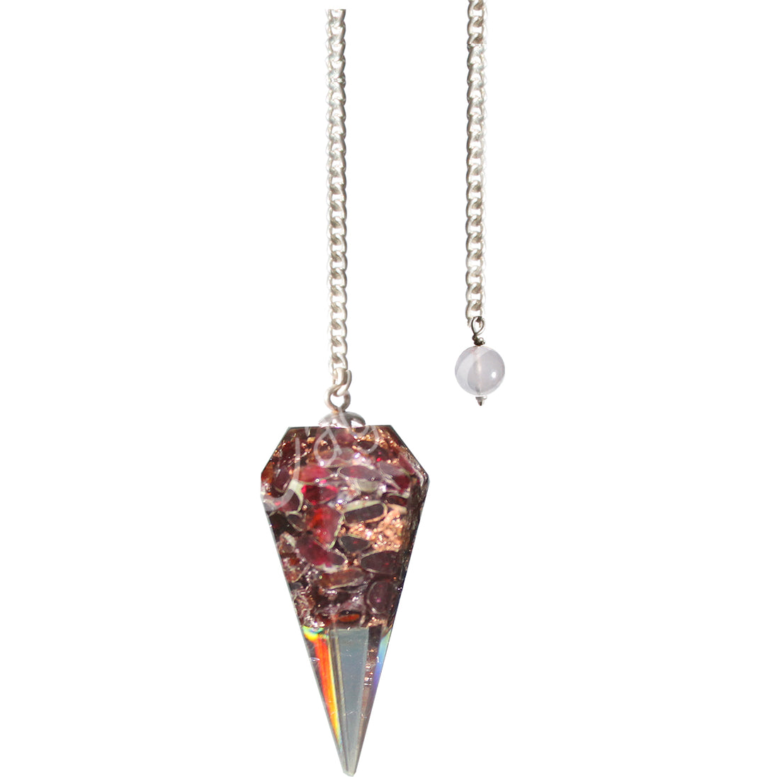 An hexagonal garnet in orgone pendulum with a silver chain.