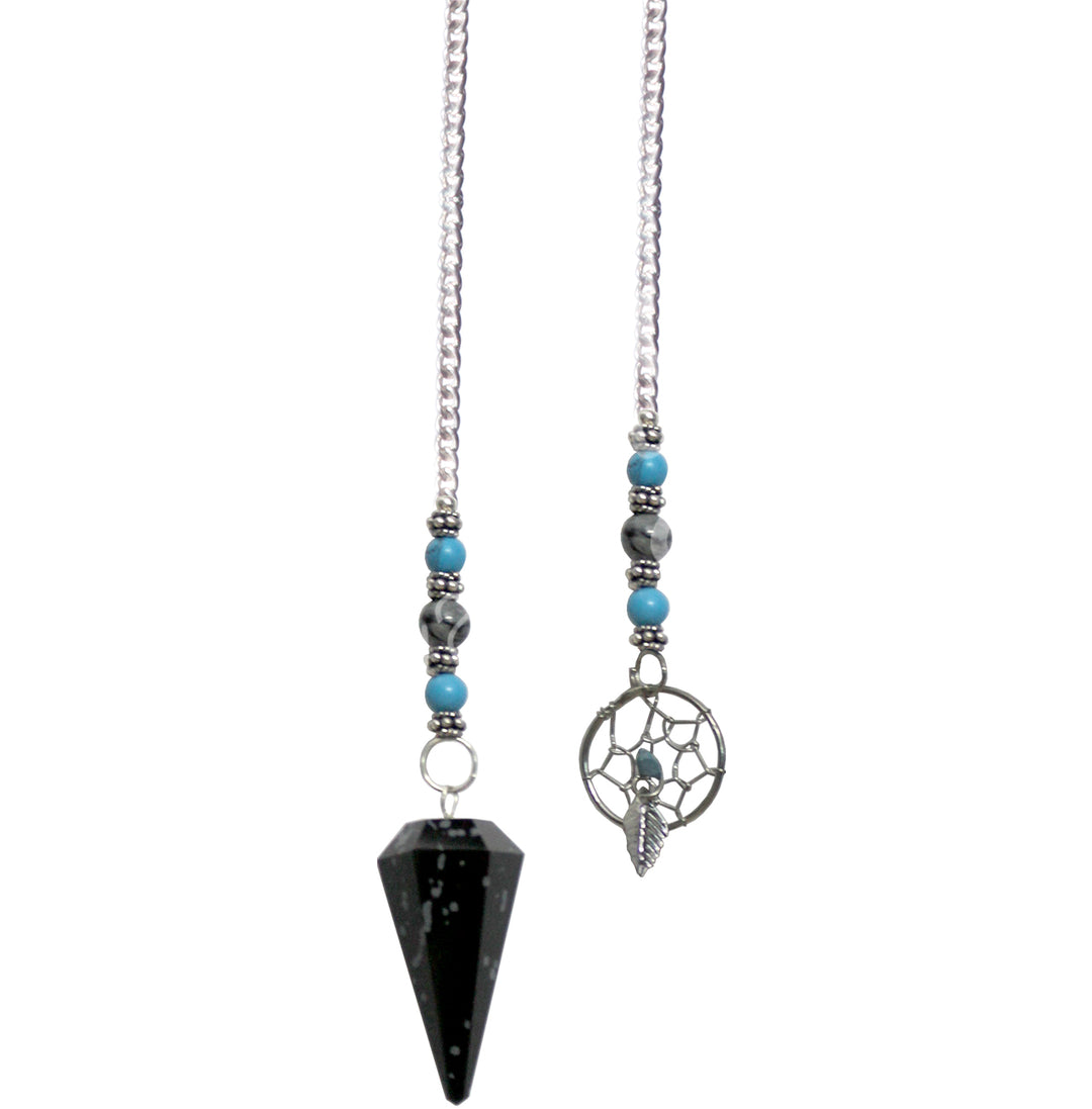 An hexagonal snowflake obsidian pendulum, adorned with a dreamcatcher medallion and turquoise beads.
