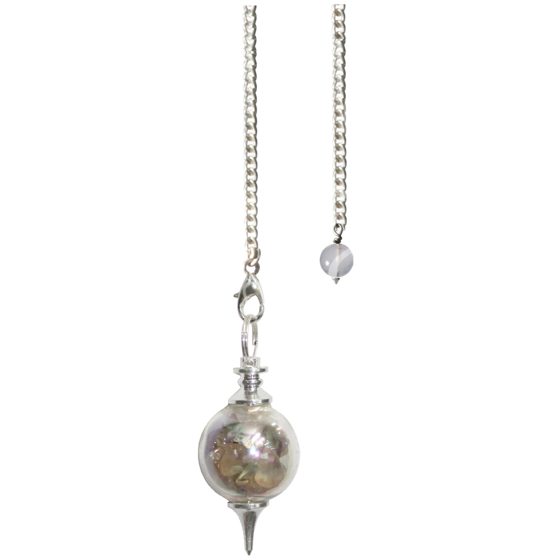 Silver pendulum with a spherical clear chamber filled with rose quartz & mixed tourmaline chips, finished with a pointed metal tip and suspended from a silver chain with a small round bead at the end.