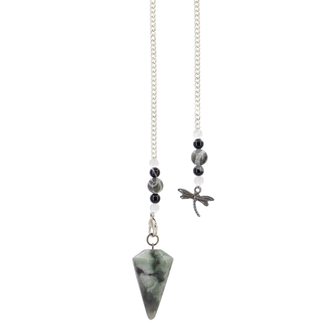 An hexagonal emerald pendulum with black onyx and crystal quartz beads on the chain and a dragonfly medallion.