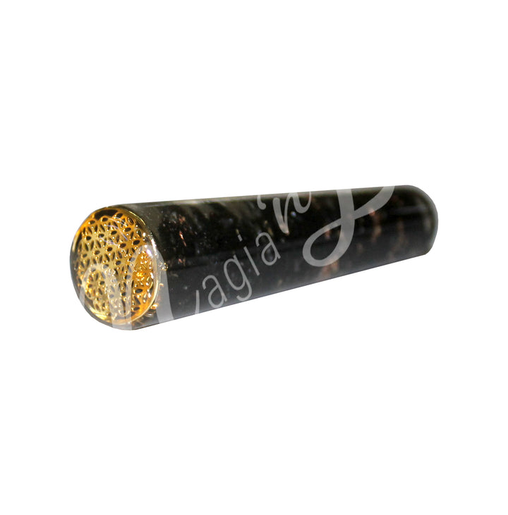 Polished black tourmaline in orgone massager with flower of life design, ideal for reflexology, acupressure, or crystal healing therapy.