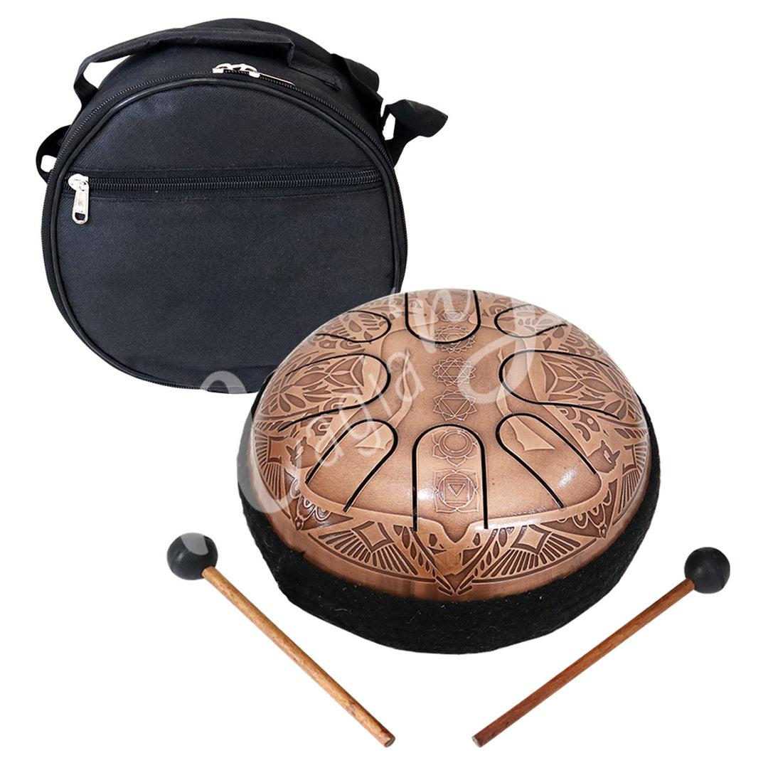 An iron tongue drum with chakra design, accompanied by two wooden mallets with black rubber heads and a round black carrying case.