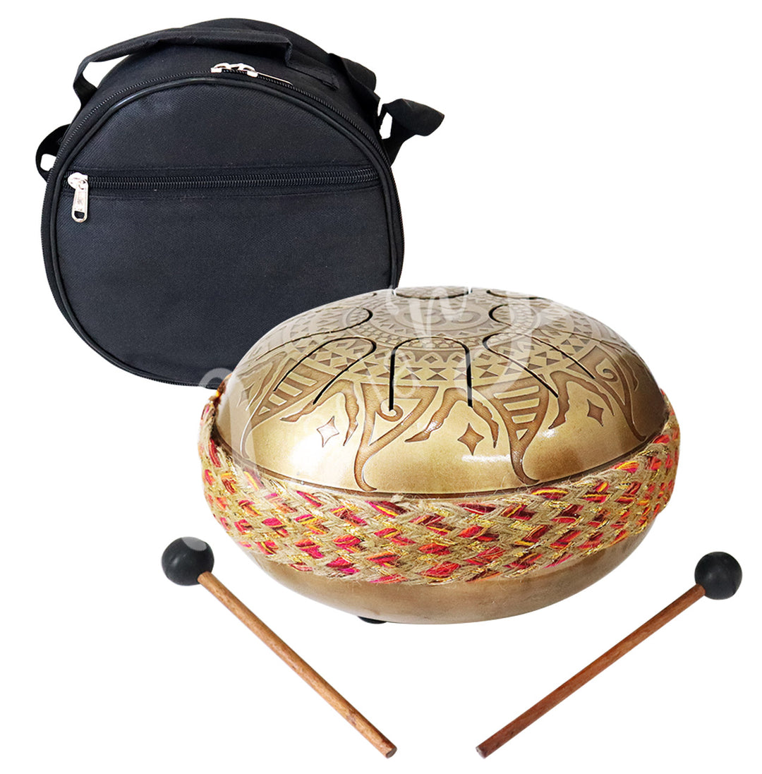An iron tongue drum with an OM design, accompanied by two wooden mallets with black rubber heads and a round black carrying case.