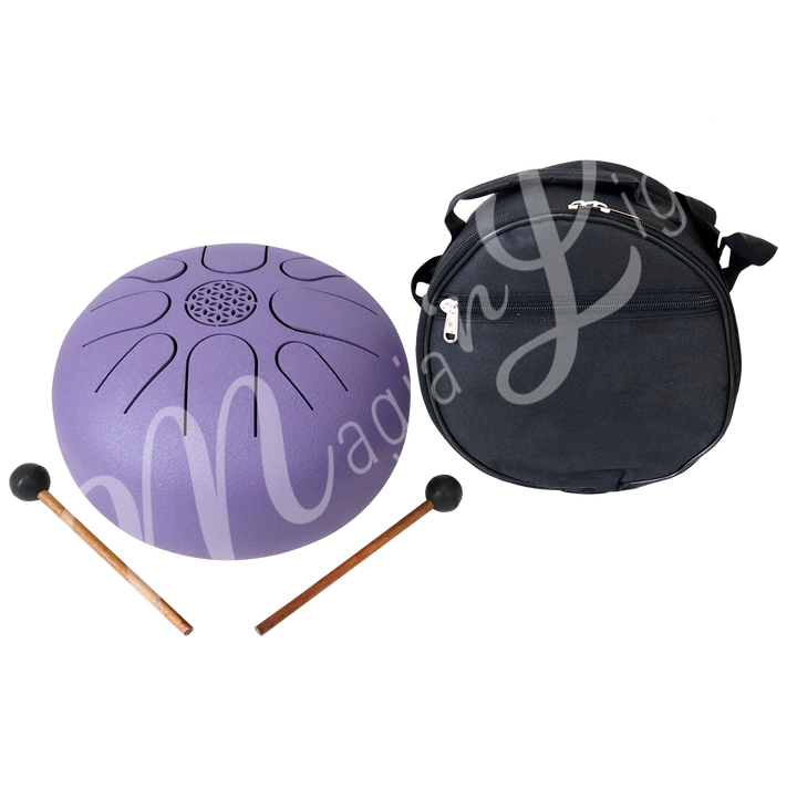 A purple iron tongue drum, accompanied by two wooden mallets with black rubber heads and a round black carrying case.