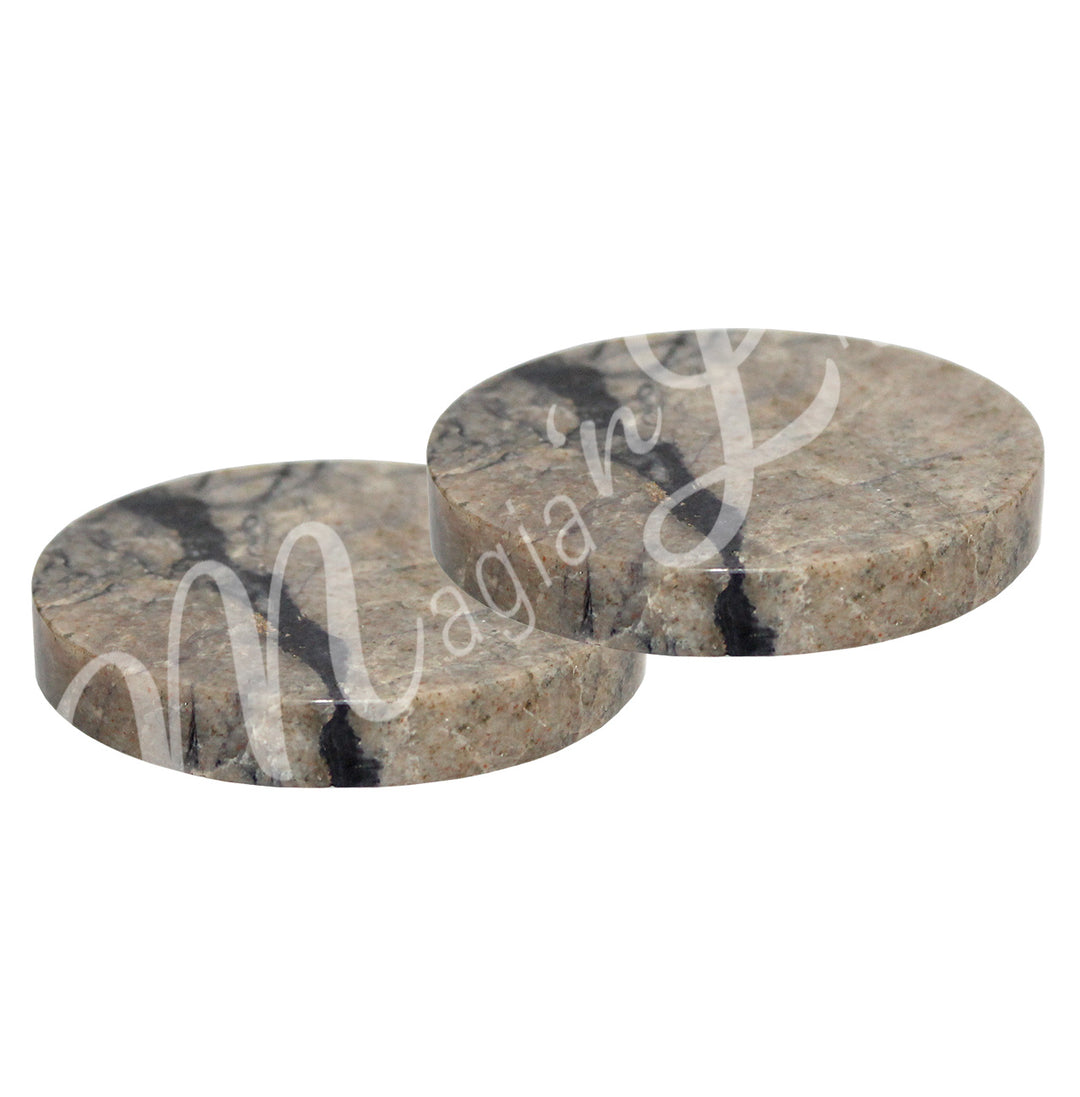 Two round tiffany stone coasters..