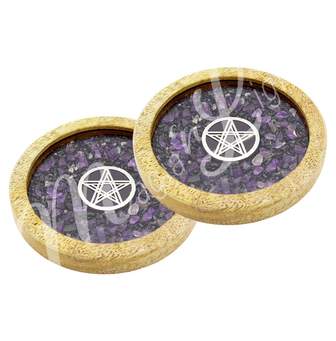 Two round wooden coasters filled with Black Tourmaline & Amethyst chips, featuring a silver pentacle symbol in the center.