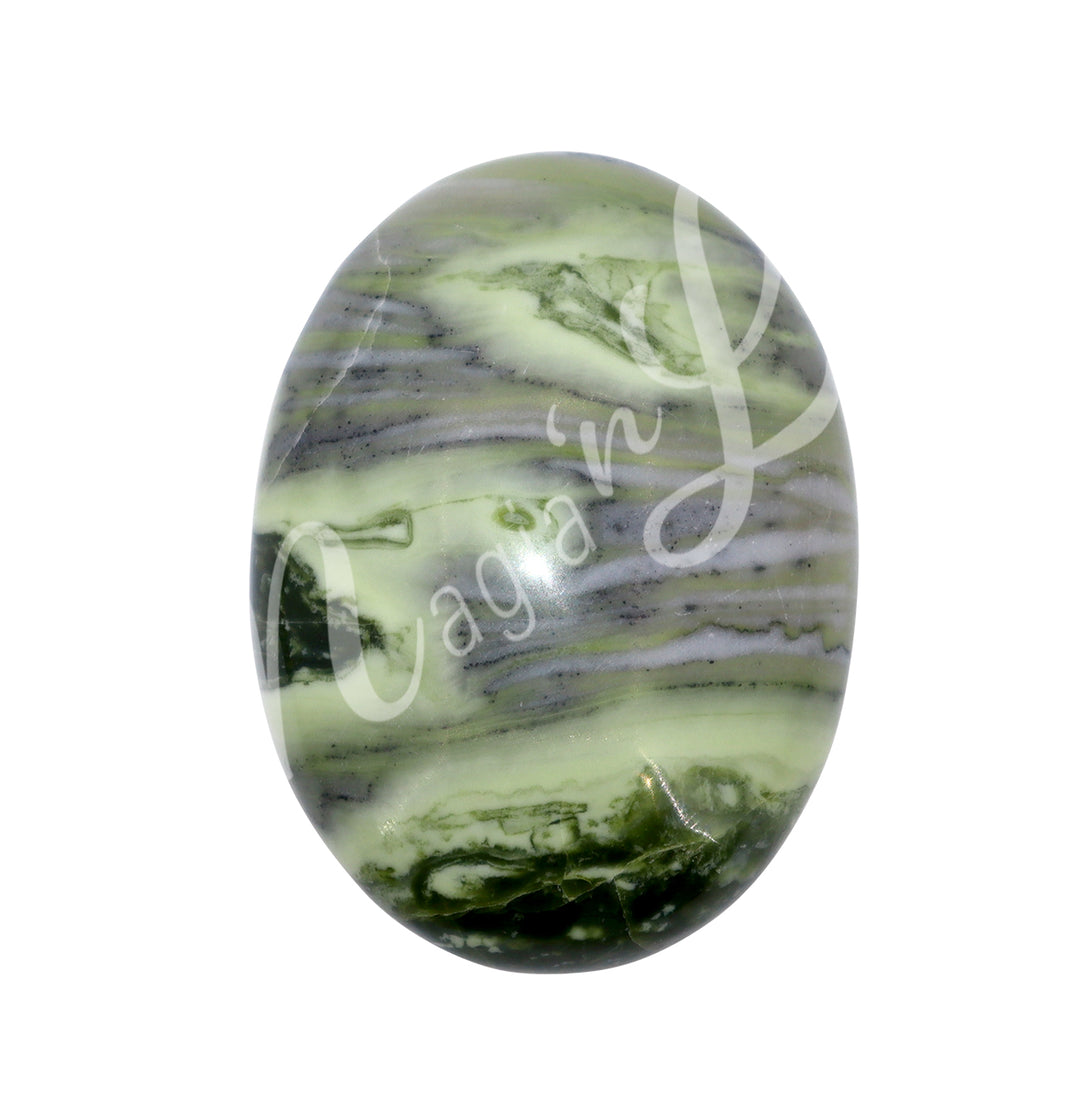 Close-up of a polished oval palm stone made of infinite serpentine.