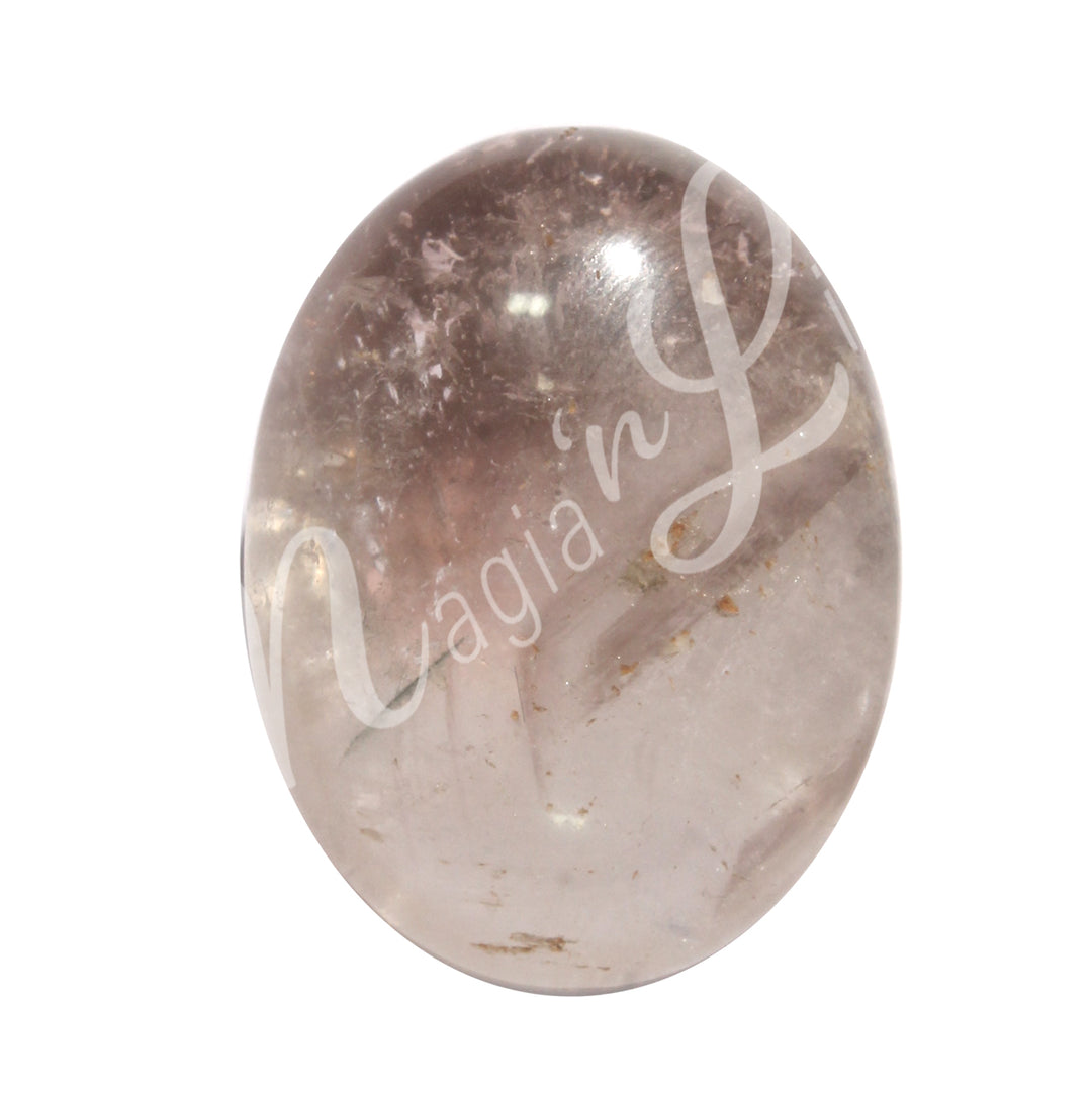 Close-up of a polished oval palm stone made of smoky quartz.