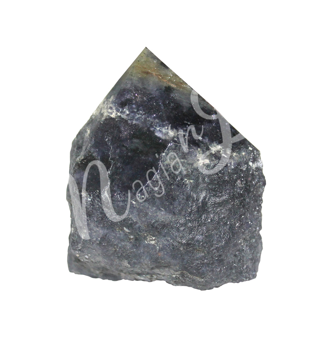 A piece of dark gray stone. The top is cut to form a point.