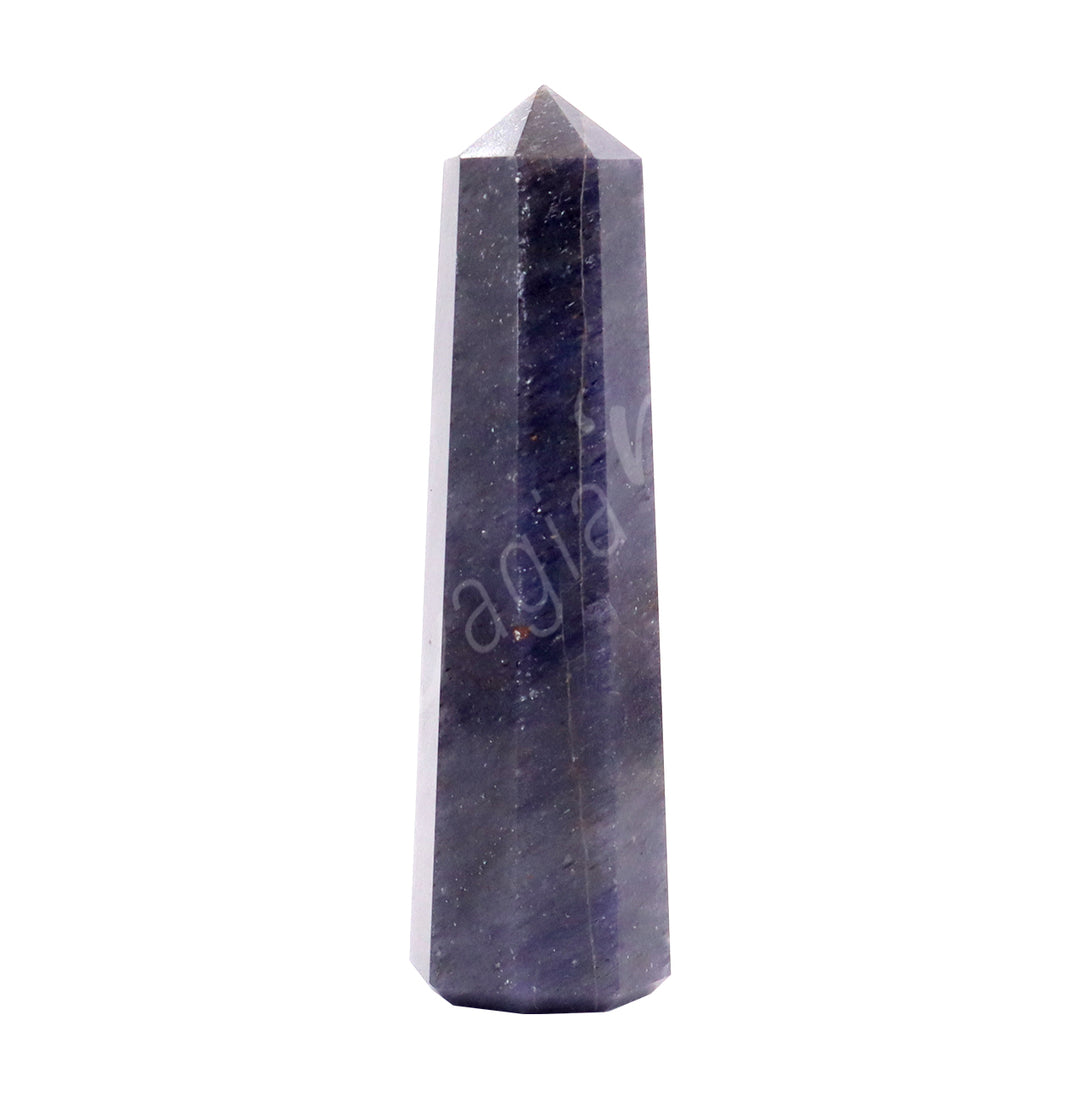 A dark blue and purple standing point with subtle gray streaks along its smooth, polished surface.