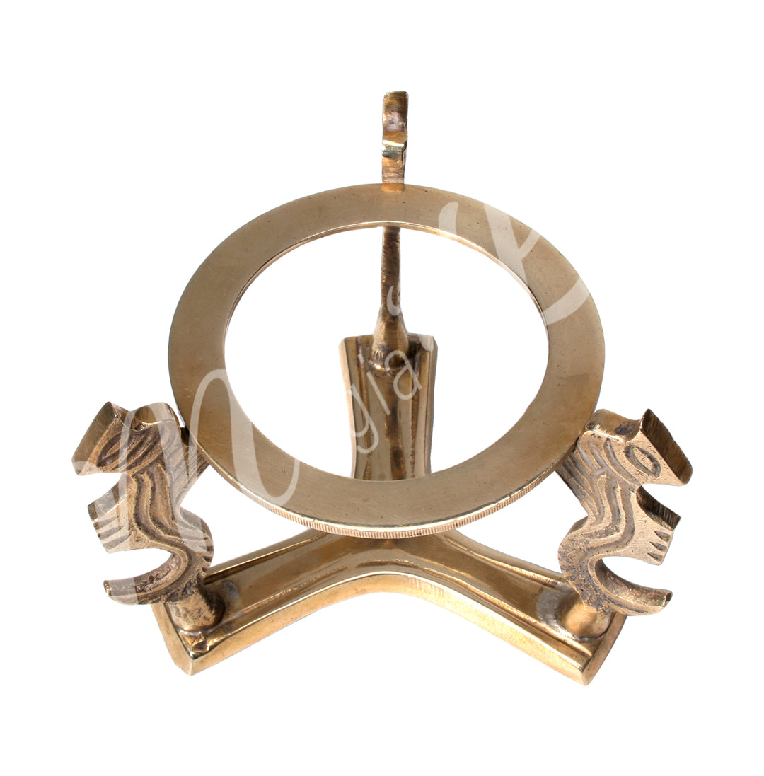 A brass stand for spheres, adorned with three dragons.