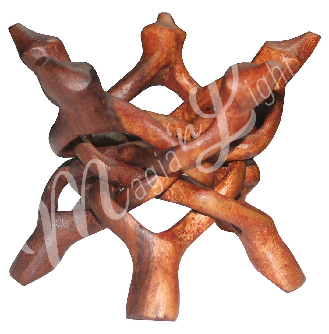 A carved wooden tripod stand with interlocking legs.
