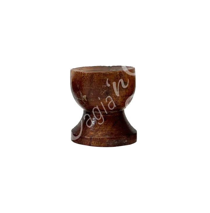 A wooden holder with a wide base.