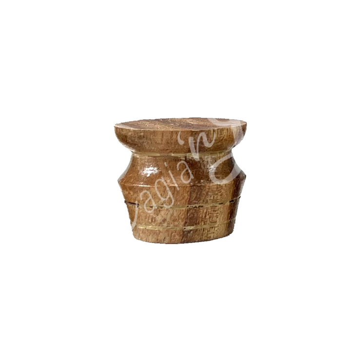 A wooden holder with a round base.