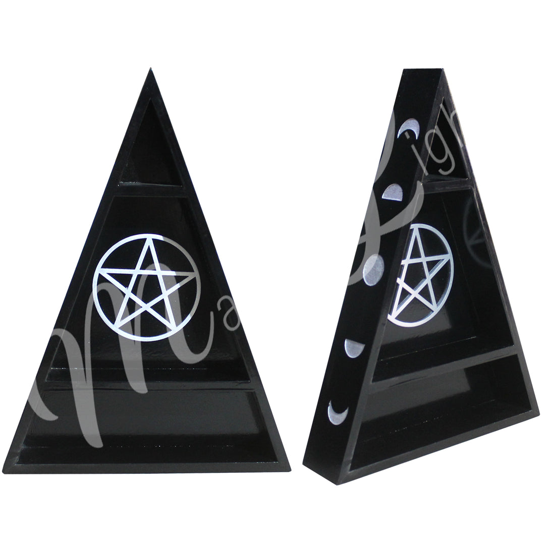 A black wooden triangle display for stones, adorned with a moon phase design on the sides and a pentacle charm at the center.