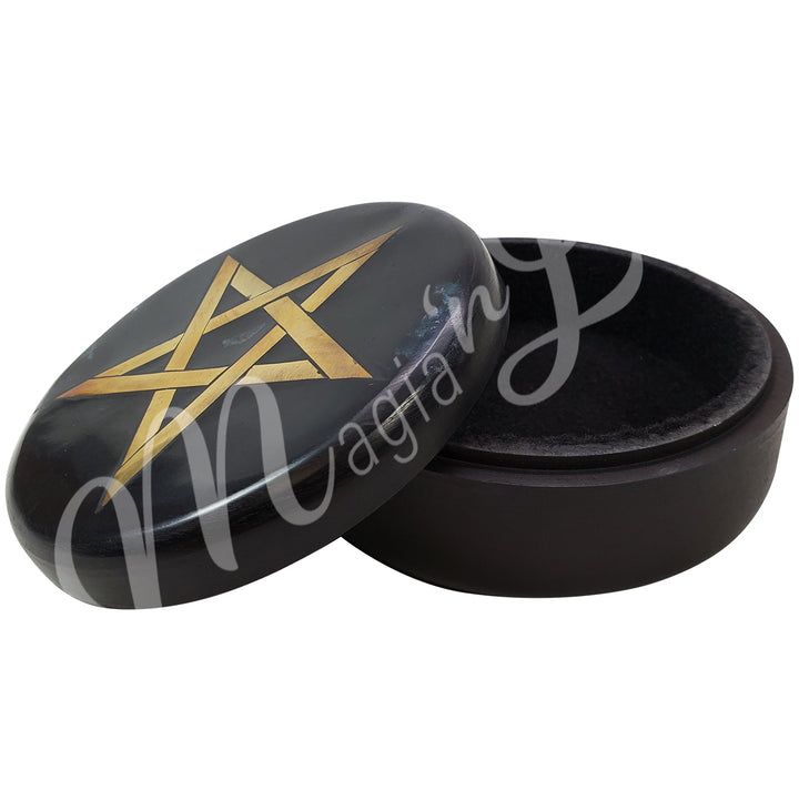 The soapstone box is open with the lid on the side. On the lid features an inlaid pentacle in gold color.