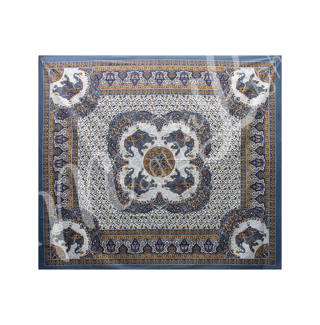 A tapestry featuring 4 elephants in the center and one each corner.
