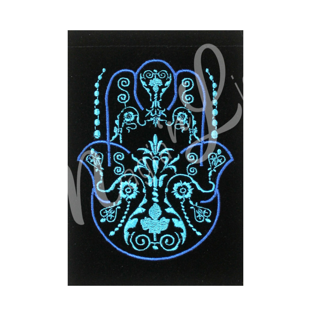 A black bag featuring an embroidered Hand of Fatima design
