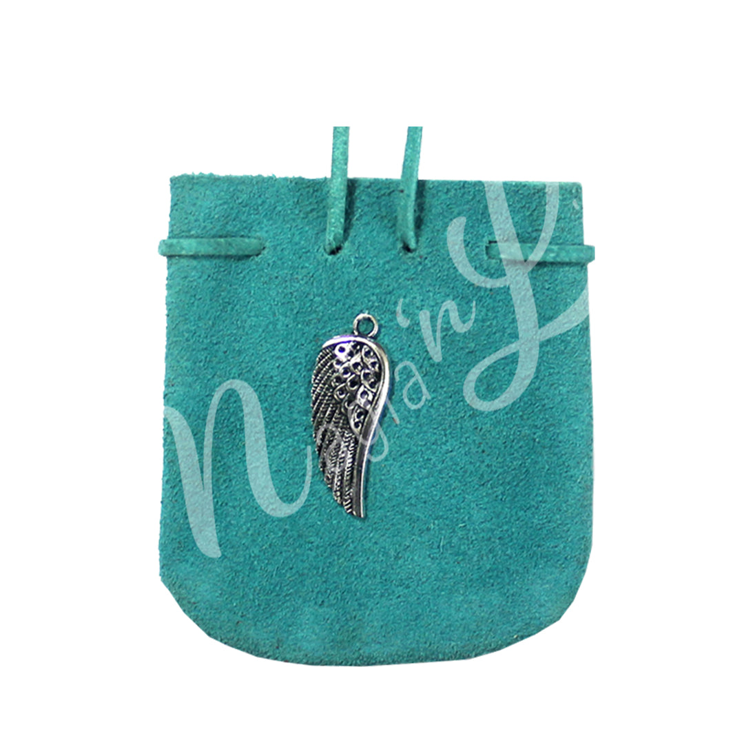 A turquoise suede bag adorned with an angel wing charm.