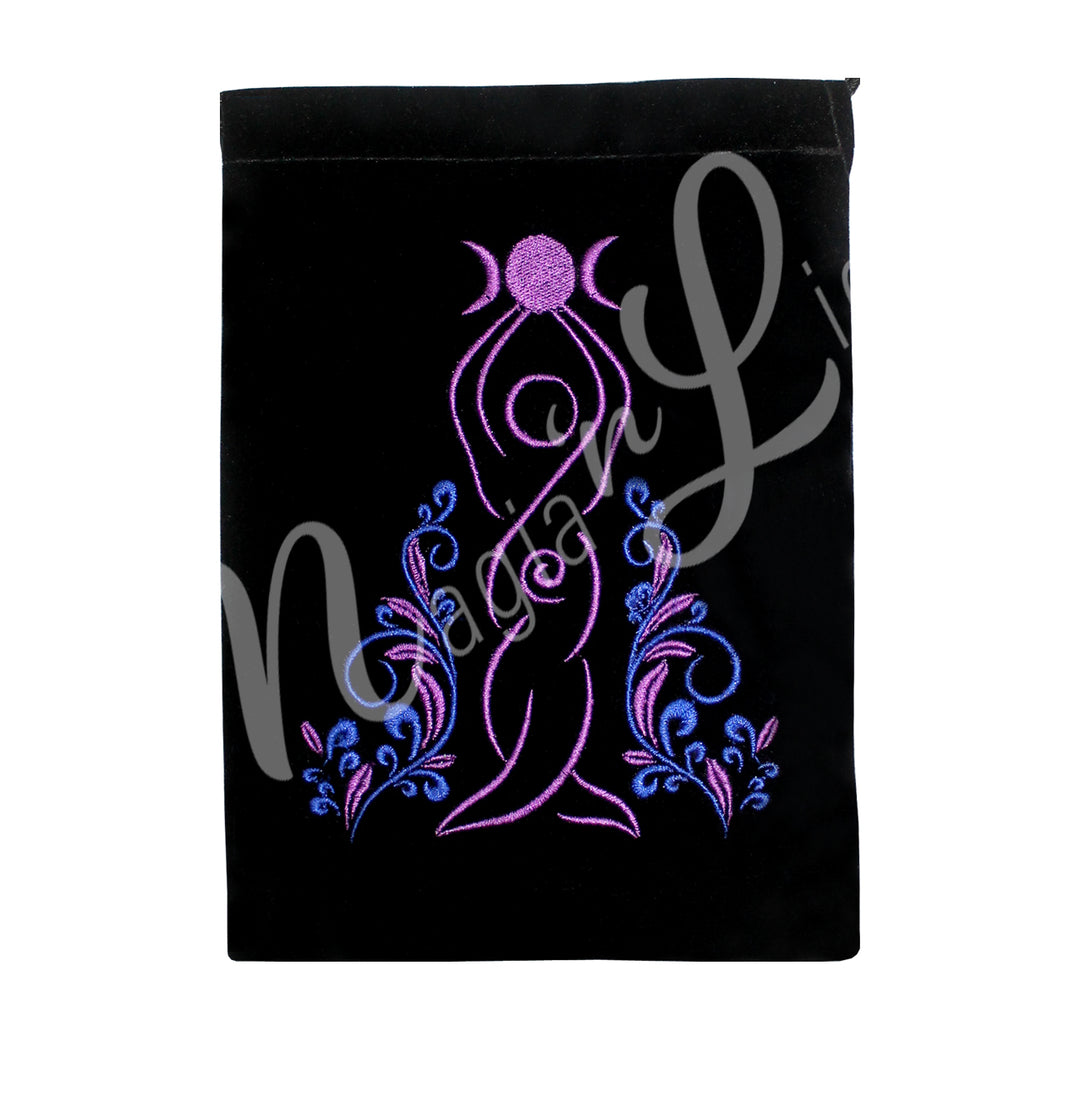 A black velvet bag featuring a purple Triple Moon Goddess design with decorative plant embroidery.