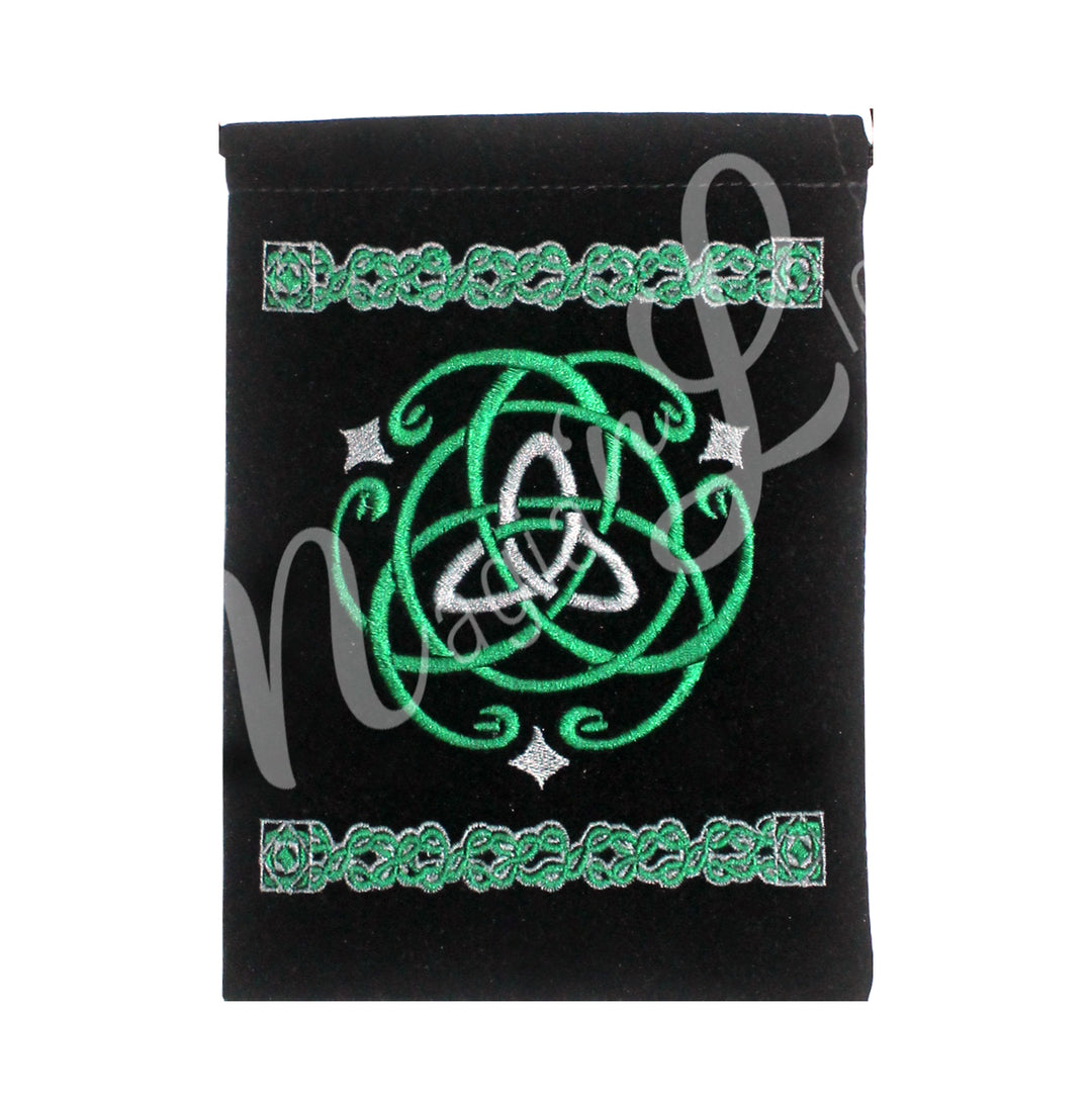 A black velvet bag featuring an green triquetra.