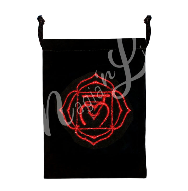 A black bag featuring an embroidered root chakra red design