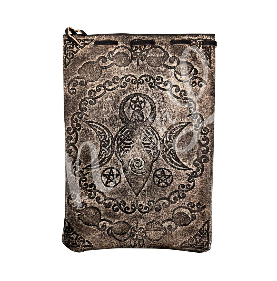 A brown leather bag featuring a Celtic moon with a goddess, surrounded by a decorative circle.