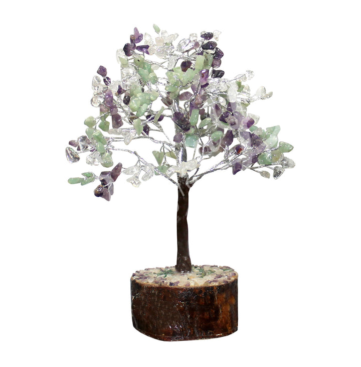 A wire gemstone bonsai tree with amethyst, crystal quartz and green aventurine chips, mounted on a natural base.