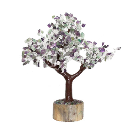 A wire gemstone bonsai tree with amethyst, crystal quartz and green aventurine chips, mounted on a natural base.