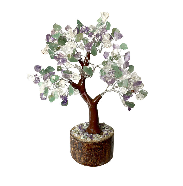 A wire gemstone bonsai tree with amethyst, crystal quartz and green aventurine chips, mounted on a natural base.