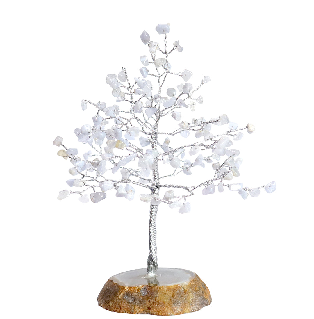 A wire gemstone bonsai tree with agate blue lace chips, mounted on a natural agate base.