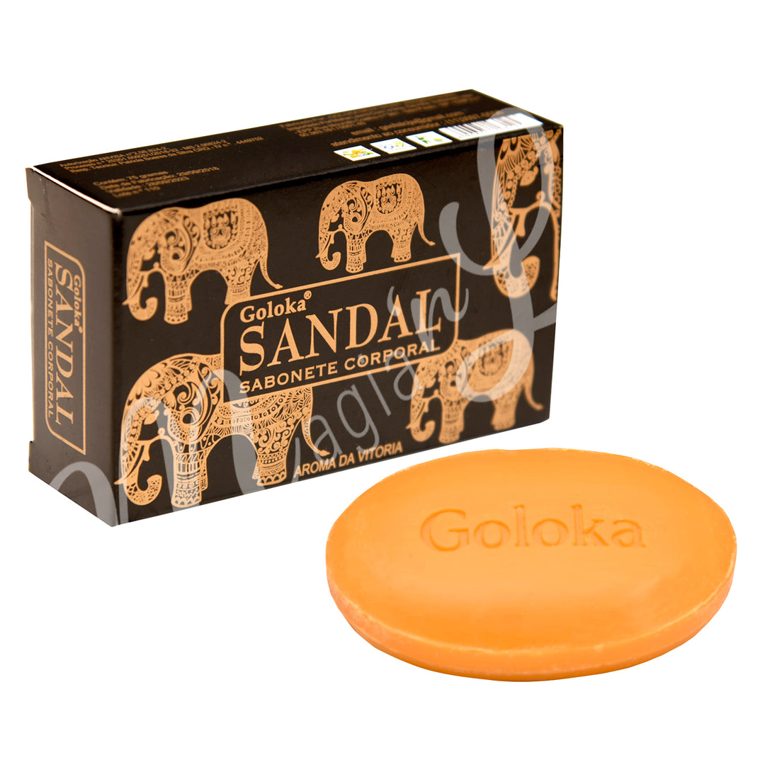 A photo of the retail box with the soap outside. The words on the packaging : goloka, sandal, sabonete corporal, aroma da vitoria are on the front.
