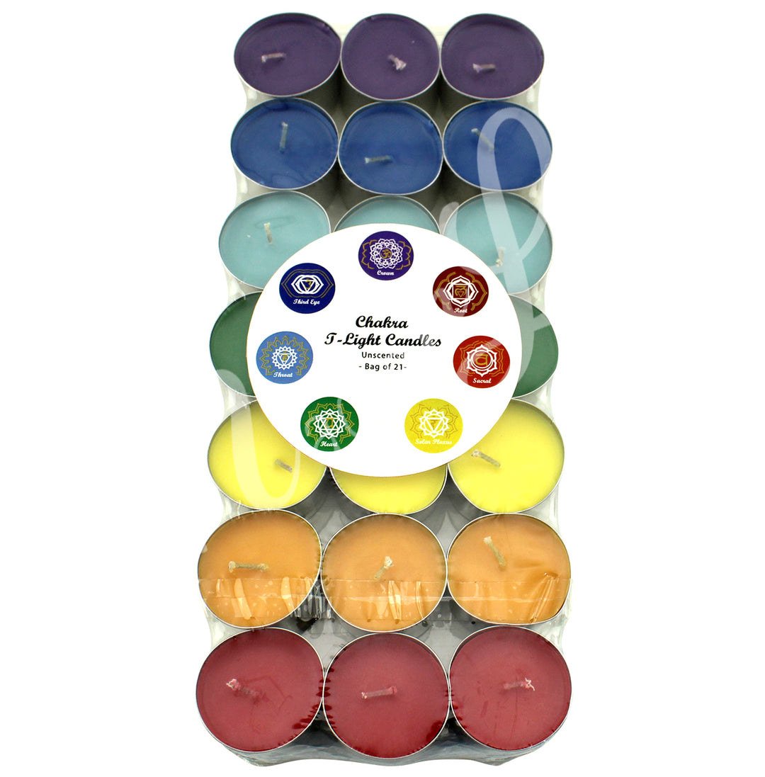 A pack of 21 unscented tealight candles arranged by color in seven rows of three: purple, deep blue, light blue, green, yellow, orange, and red. A round center label reads: “Chakra, T-Light Candles, Unscented, Bag of 21.”
