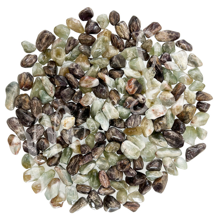 Collection of polished tumbled stones in shades of green, yellow, brown, and cream, arranged together in a circular pile.