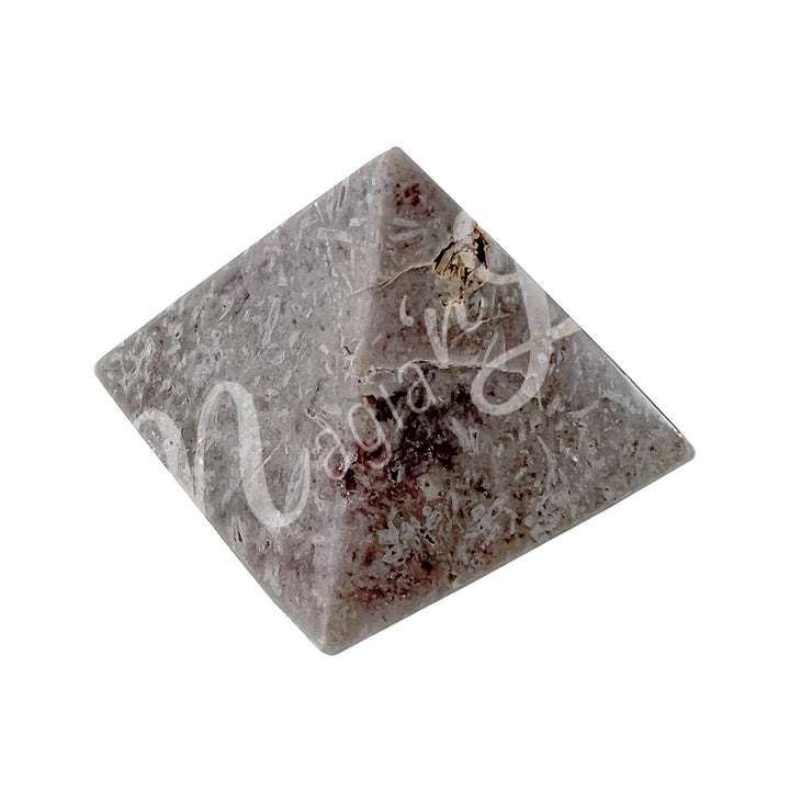 A four side pyramid made of Pink Amethyst, Seen with an angle.