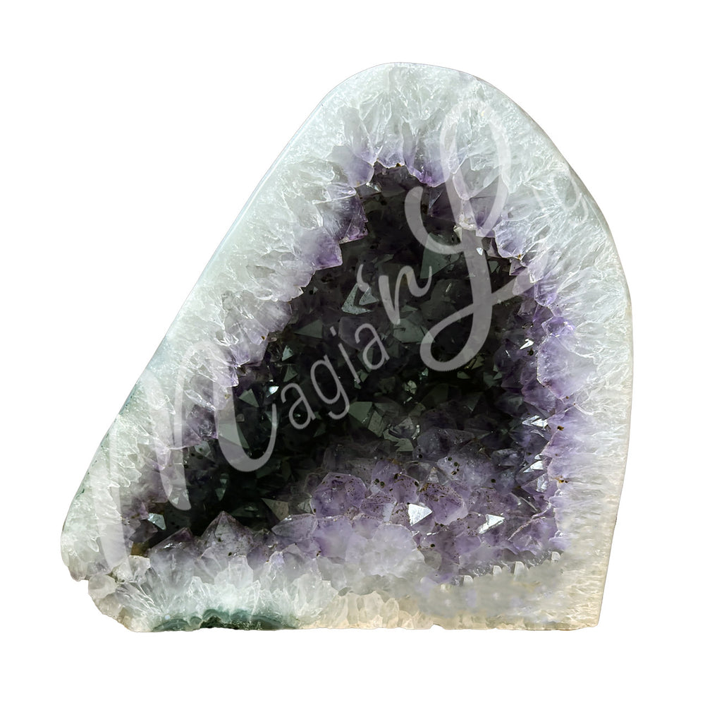 Front view of an amethyst cathedral. The center is purple with glitter while the sides go from white to beige on the exterior.